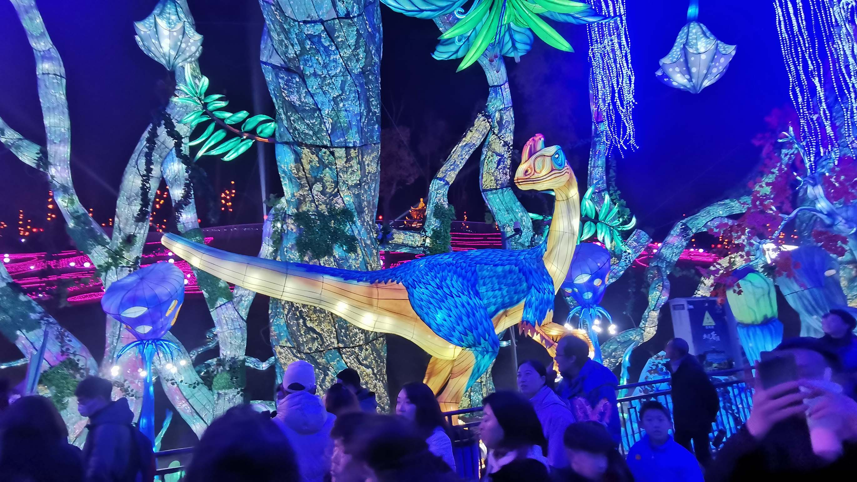 Dinosaur lantern in prehistoric jungle theme park display