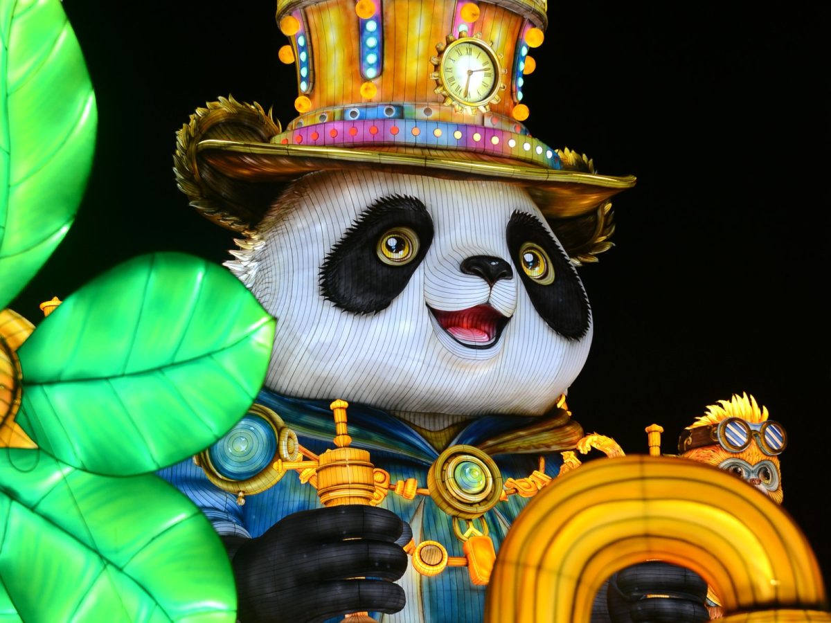 Steampunk panda with top hat lantern in a zoo lights display