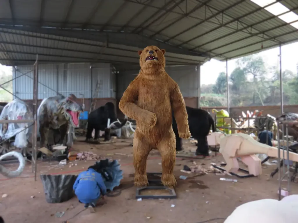 Front view of animatronic cave bear showing domed forehead and facial profile