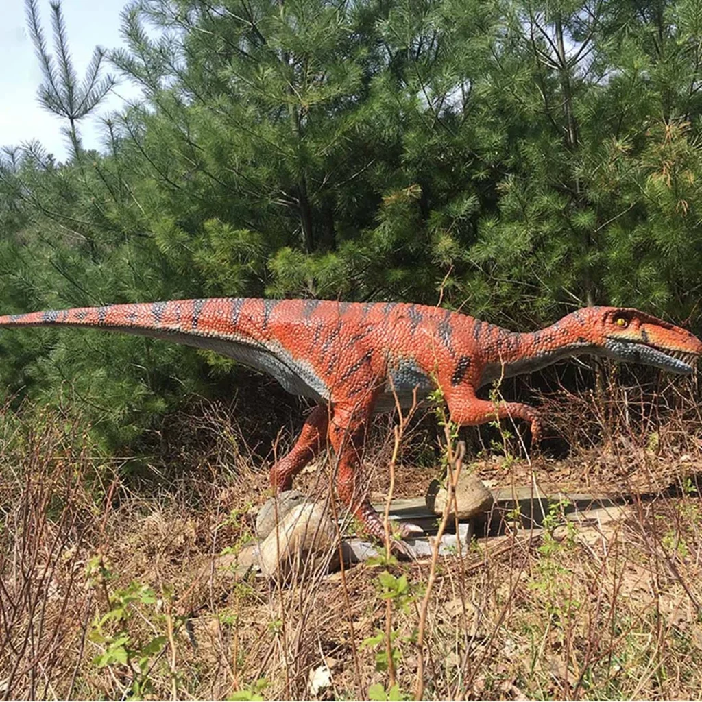 Close-up of animatronic Coelophysis head with detailed teeth and silicone skin texture