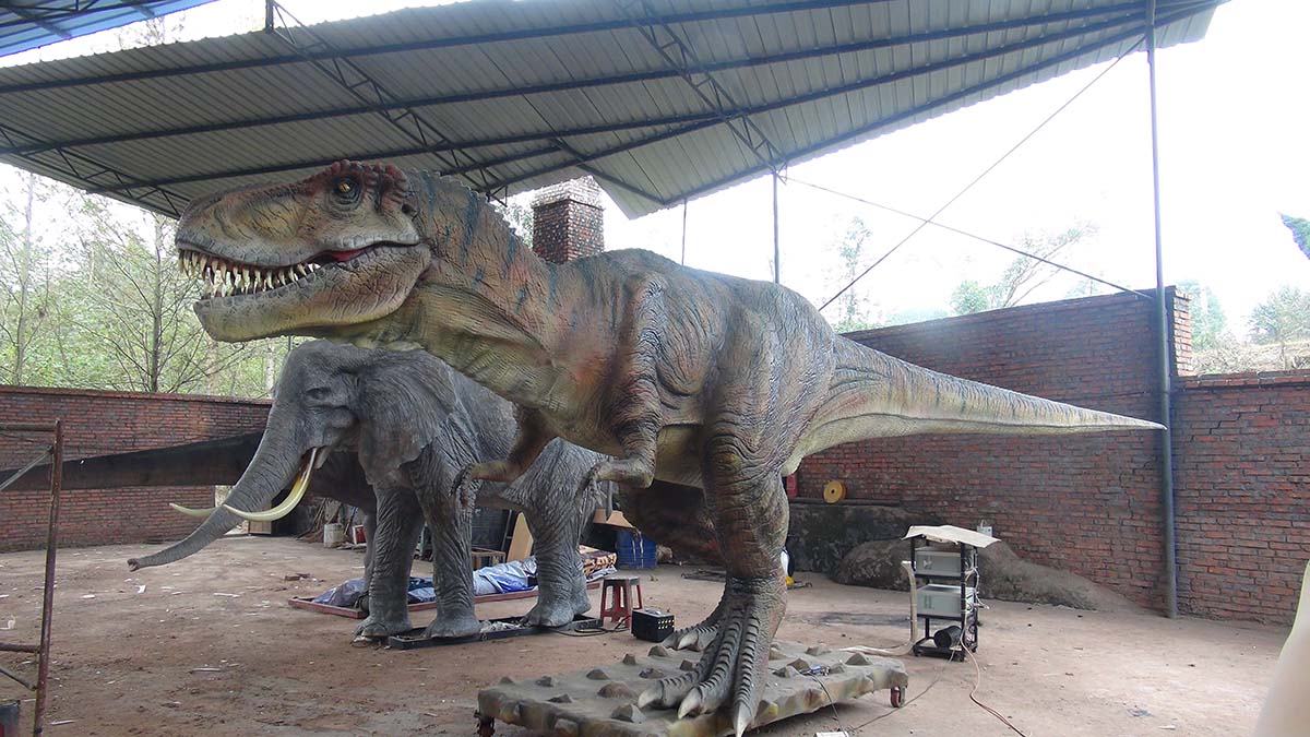 Pneumatic-powered animatronic Tyrannosaurus Rex dinosaur in action with air cylinders
