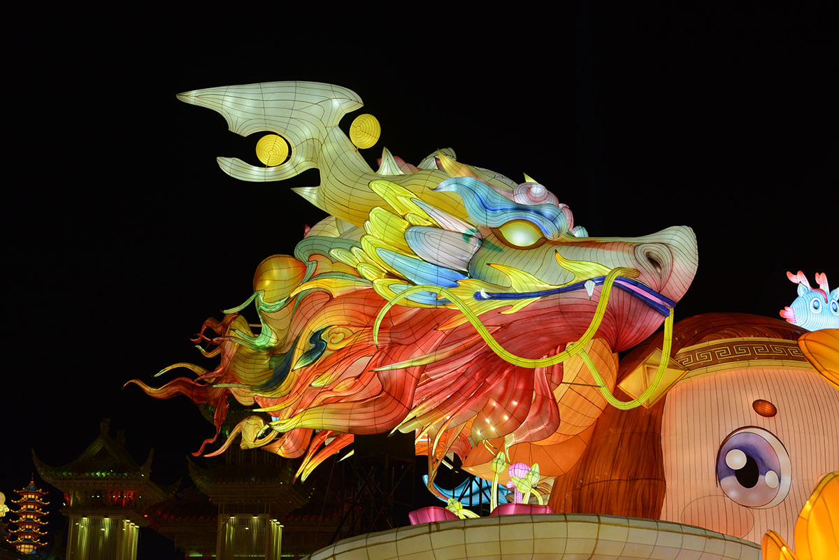 Dragon head lantern showing light transmission and color blending effects of densified polyester satin fabric