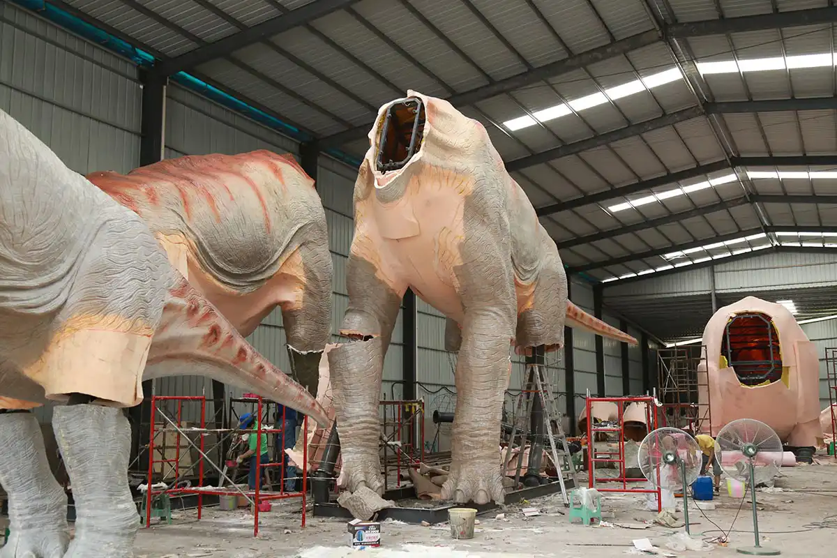 Animatronic dinosaur for shopping mall production — giant brachiosaurus frames being assembled at the Zigong factory