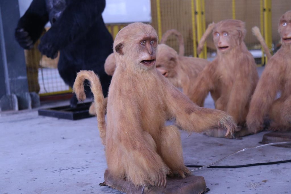 Animatronic animal collection — group of lifelike robotic monkeys with gorillas for zoo and theme park exhibits