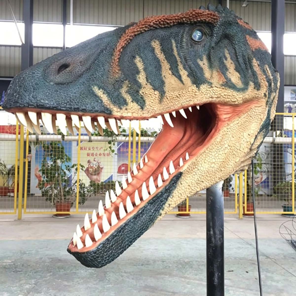 Close-up of a FestiveLanterns interactive animatronic T-Rex head, showing hand-painted silicone skin texture and articulated jaw