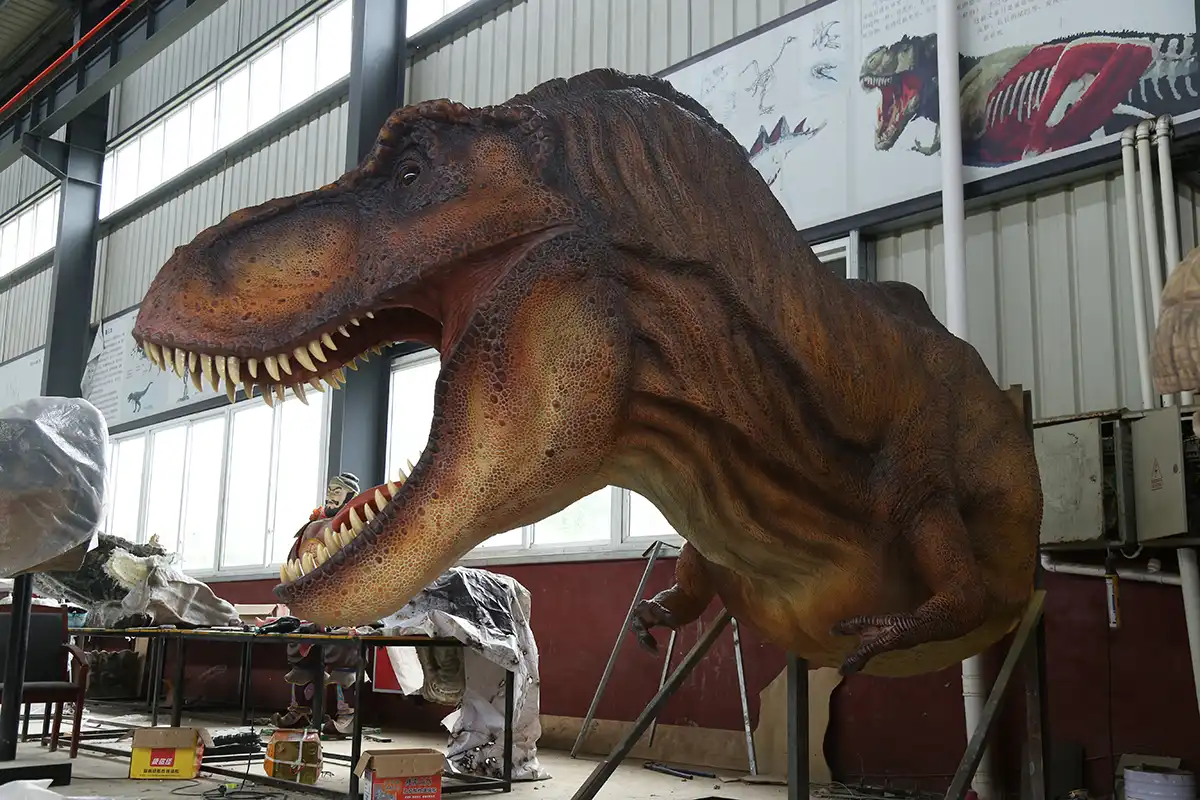 Gesture-sensing dinosaur sensor fusion technology — full body T-Rex animatronic in workshop showing ultrasonic and infrared sensor integration points