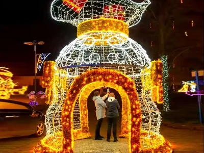 Christmas Light Sculpture Walk-Through Archway — Reindeer & Gift Tunnel