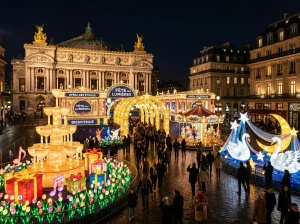 Light festival lantern piazza with an illuminated fountain, carousel, swan and crescent moon lanterns on a city square in front of a grand facade