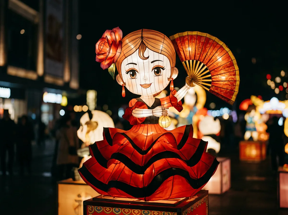 Flamenco dancer lantern display with red ruffled dress, fan and rose for Spanish festival programmes