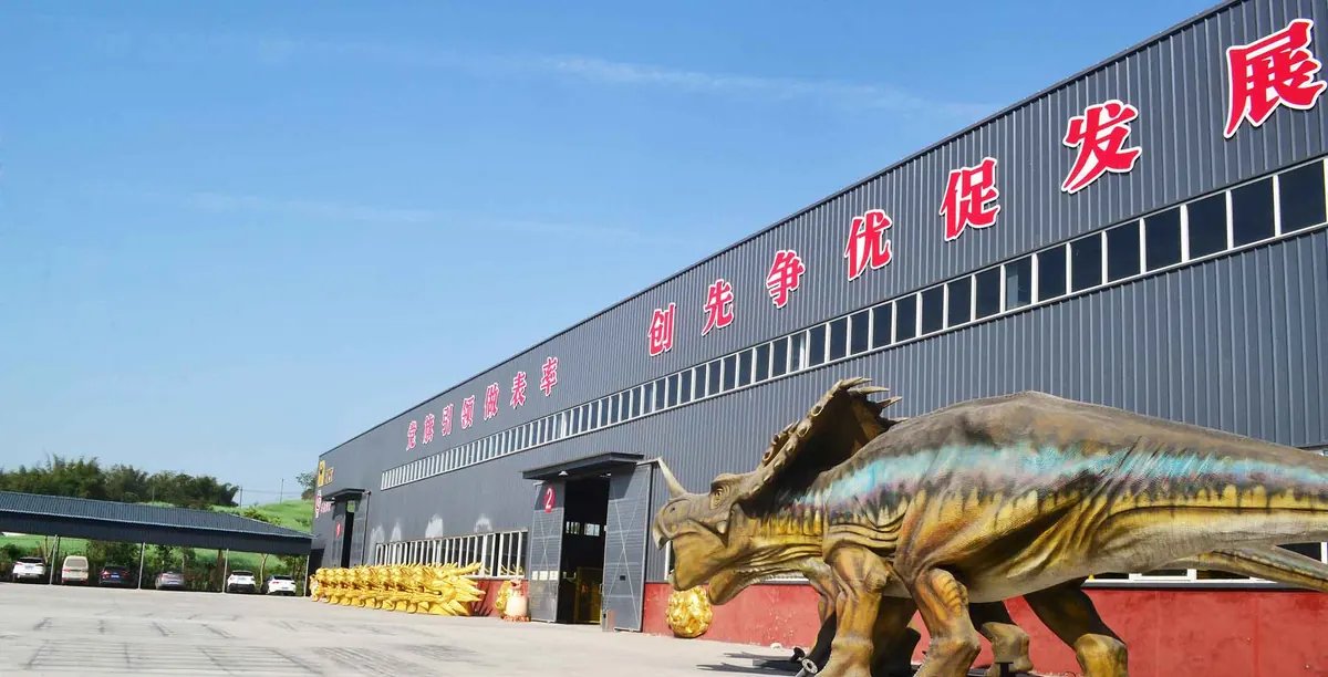 Workshop building of the FestiveLanterns factory with a life-size animatronic Spinosaurus standing outside
