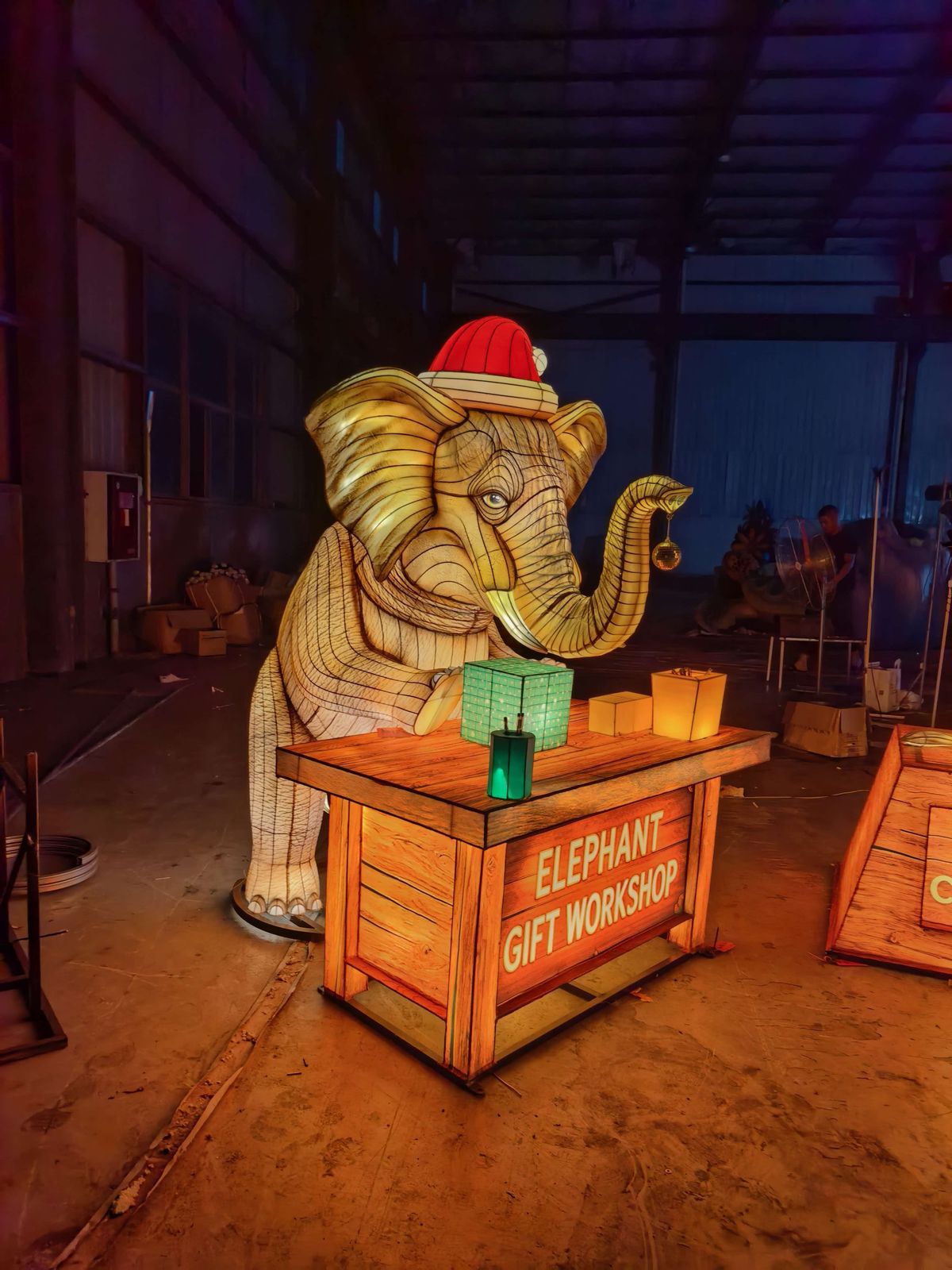 Christmas Elephant with Gifts in warm festival lighting