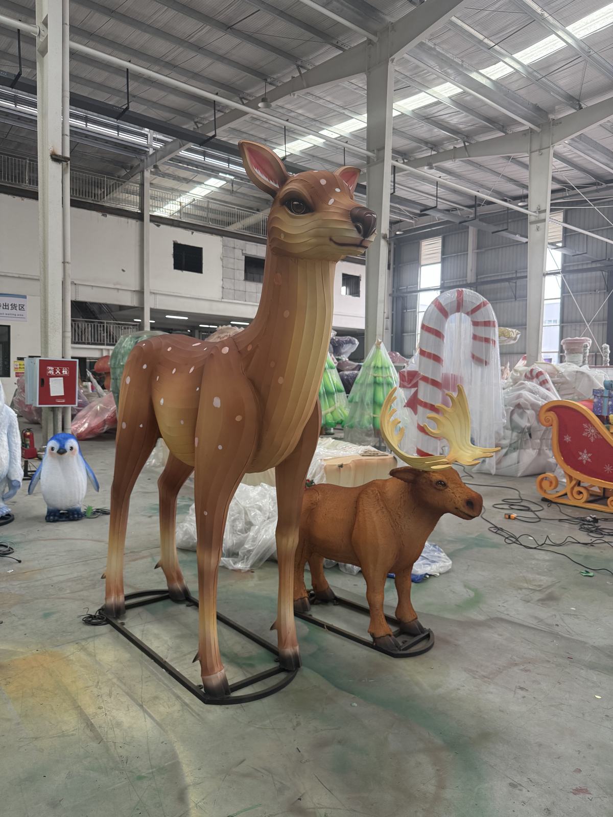 Deer Lantern Group in warm festival lighting