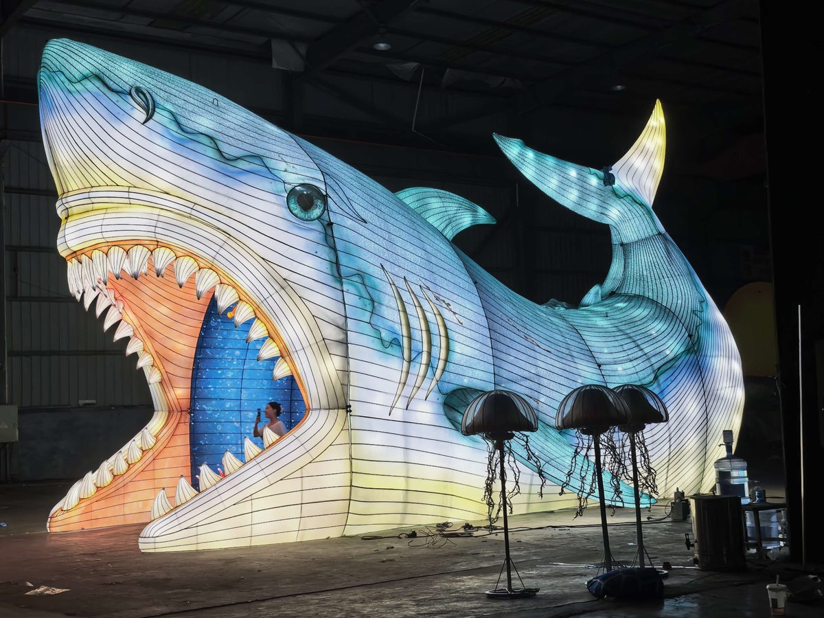 Great White Shark Lantern in warm festival lighting