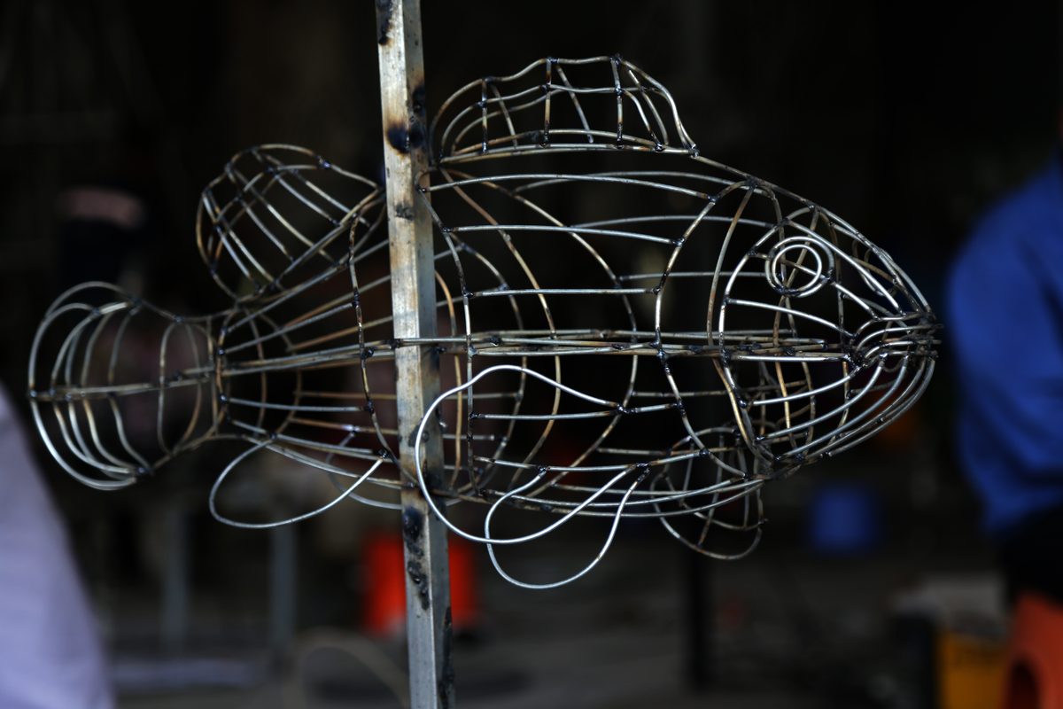 Bare wire frame of a fish lantern before covering, showing the welded structure
