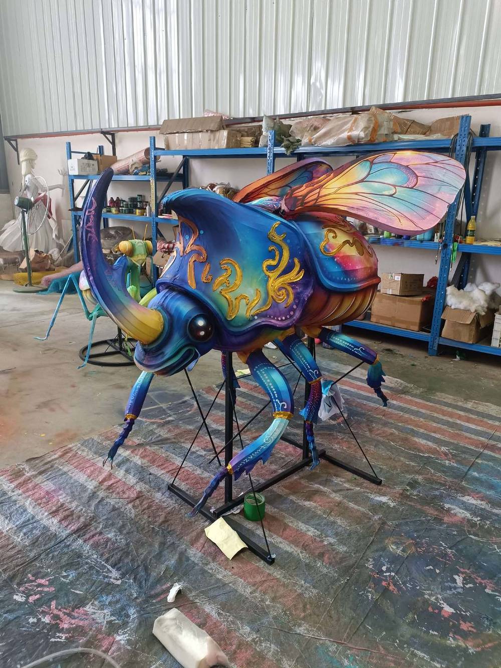 Rhino Beetle Lantern in warm festival lighting