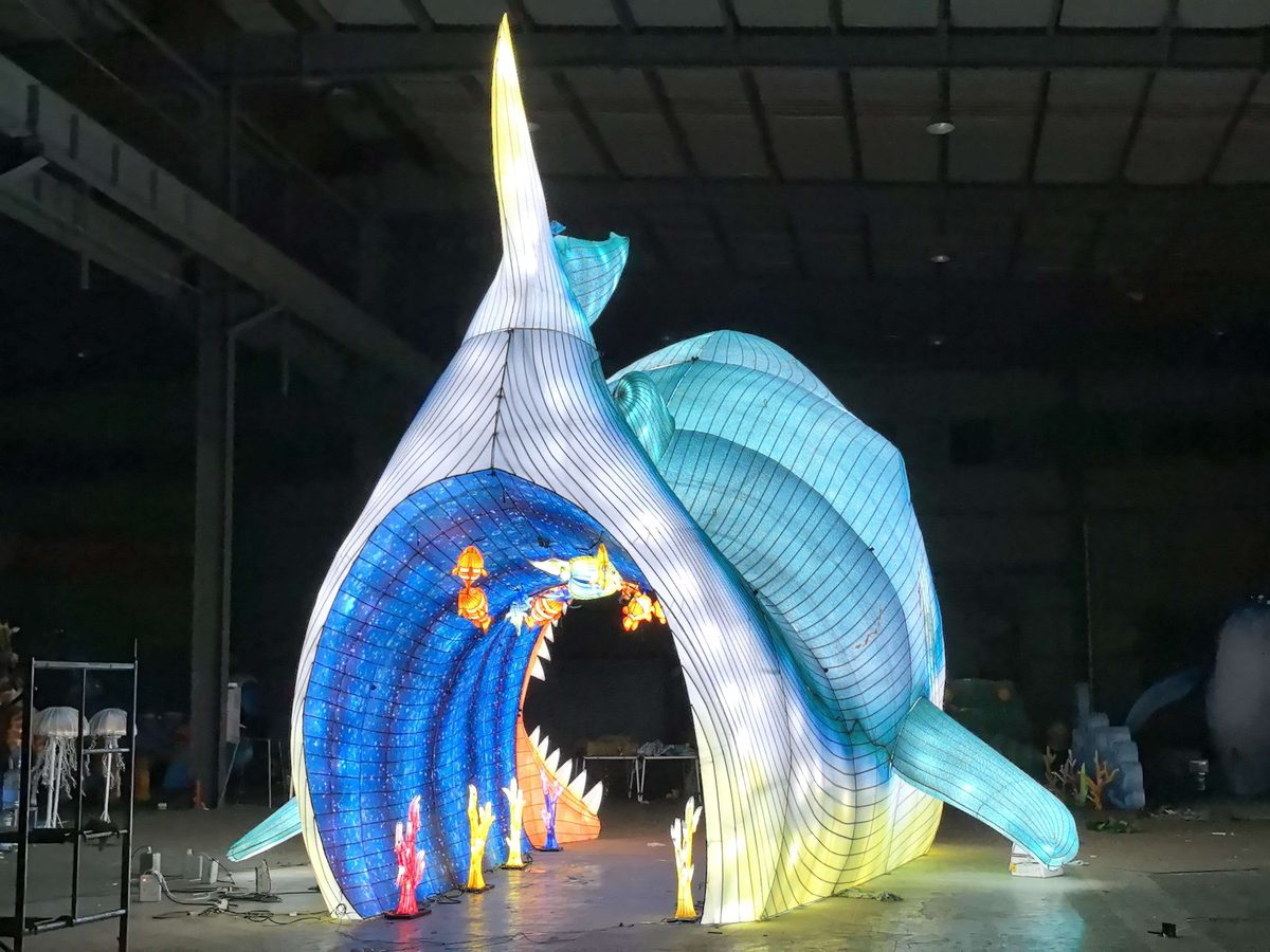 Shark Jaw Arch Lantern in warm festival lighting