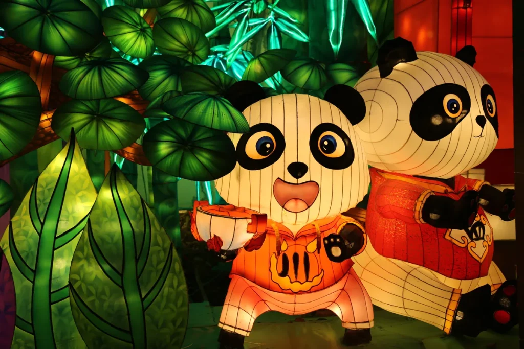 Cartoon panda lantern pair at a zoo lantern festival